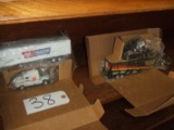 ( 2 ) FREIGHTLINER CABS WITH TRAILERS ( ERTL COLLECTIBLES )