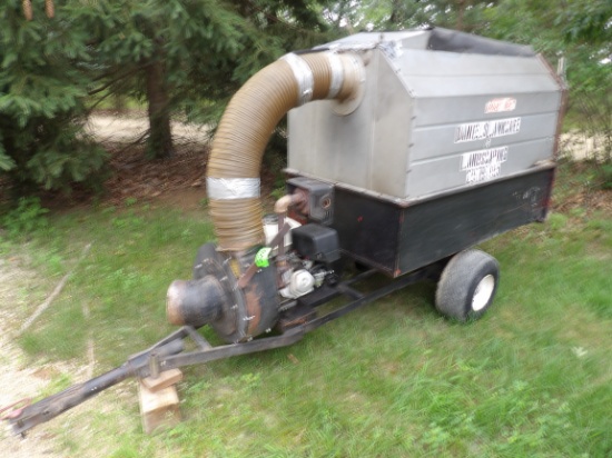 TRAC VAC YARD VACUUM ON TRANSPORT