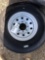 New 235/85R16 - 14 Ply Trailer Tire on 8 Lug Silver Wheel