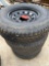 4 - 235/80/16 10 Ply Tires on 8 Hole Black Wheels Take Offs FOUR TIMES THE MONEY MUST TAKE ALL