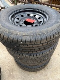 4 - 235/80/16 10 Ply Tires on 8 Hole Black Wheels Take Offs FOUR TIMES THE MONEY MUST TAKE ALL