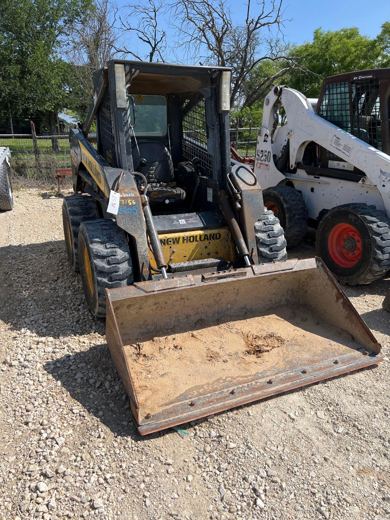 New Holland 170 Skid Steer with Bucket Hand/Feet Proxibid