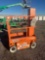 Snorkel TM16E 16ft Scissor Lift--- Works Good. This Item Located at Hwy 36 Storage - 1828 State Hwy.