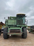 John Deere 7720 Combine with 24' Header and Header Trailer Local Farmer Machine Should be Field