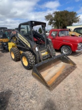 New HollandLZZ8 Skid Steer Runs and Works 2044 Hours Showing Hand and Foot Control with Dirt