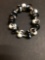 7â€ sterling silver bracelet with black and white floral ceramic Beads