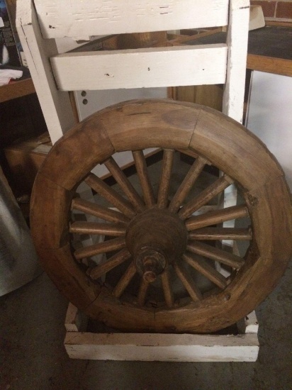 Wooden chariot or wagon wheel With wooden stand