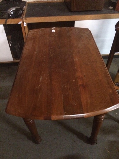 Antique drop leaf table with wheels