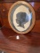Oval Frame with Silhouette Painting