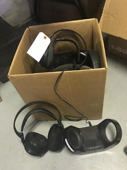 Box of Headphones and Charging Docks
