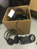 Box of Headphones and Charging Docks