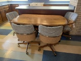 Table with 4 Rolling Chairs