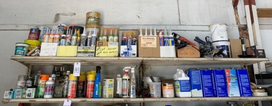 Contents of 2 shelves - caulk, sealant, foam, paint remover