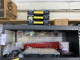Contents of shelf - bolt gauges, hardware
