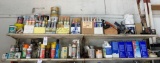 Contents of 2 shelves - caulk, sealant, foam, paint remover