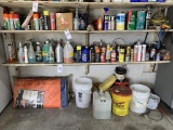 Contents of 2 shelves - lubricant, spray paint, straps, concrete curing blanket