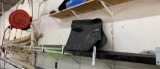 Contents of shelf - floor mats, pipes
