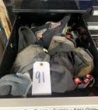Contents of drawer- gloves, knee pads