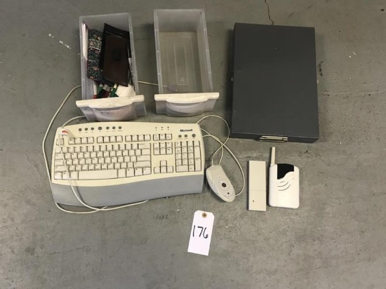 miscellaneous office items (keyboard, mouse, drawers)