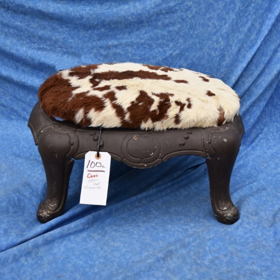 CAST IRON STOOL W/COWHIDE COVER