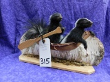 2 SKUNKS IN CANOE (ONE$)