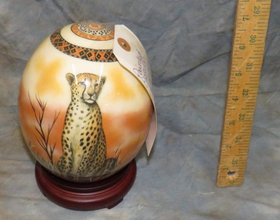 PAINTED OSTRICH EGG ON STAND