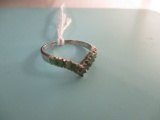 .925 Sterling ring with green stones