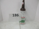 Sinclair gasoline oil bottle with dinosaur