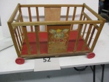 child's wheeled doll crib