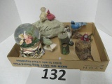 Lot of carved birds and Snow globe