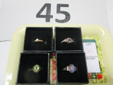 4 (four) costume jewelry rings
