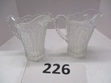 2 pressed glass water pitchers