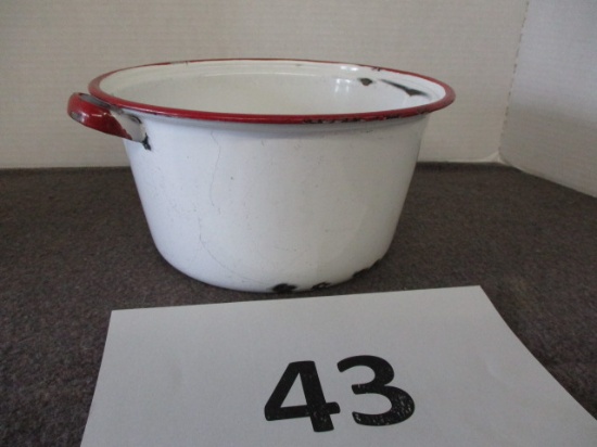 red and white enamelware pot