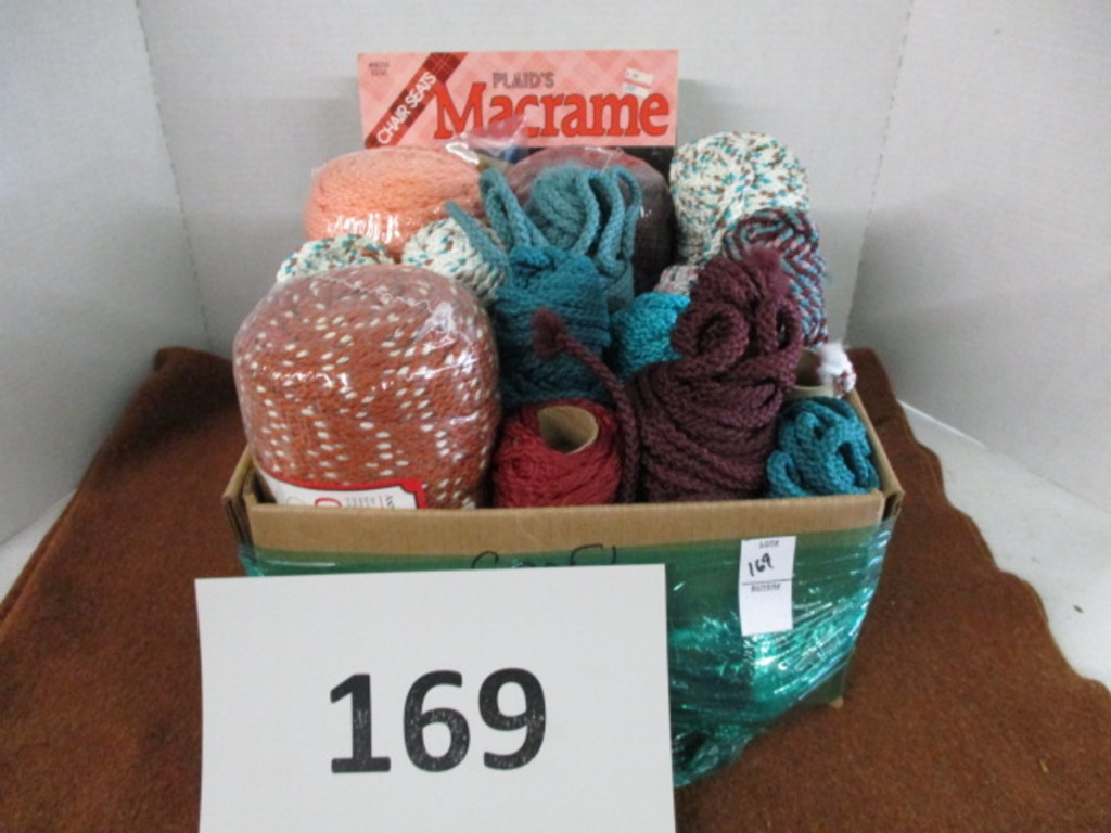 box of macrame cord and books