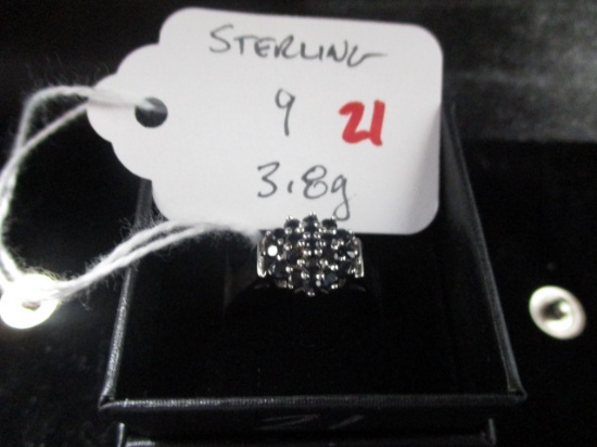 sterling silver ring with black stones