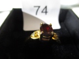 costume ring with red stone