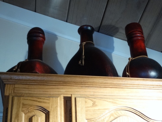 Leather or Like Bound Bottles, Vases