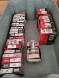 Bin of Spark Plugs