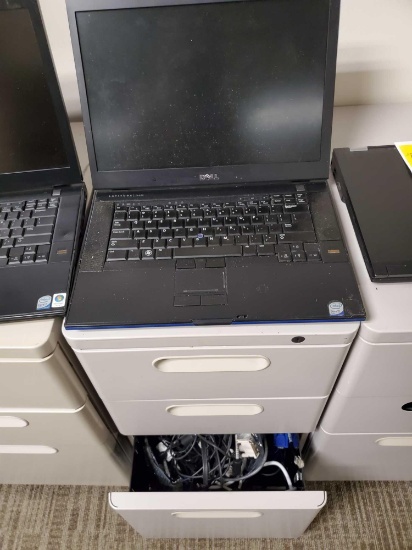 Dell Latitude E6500 Laptop and Contents of Cabinet
