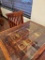 INDIA PANELED DOOR WITH METAL ACCENTS TURNED INTO TABLE WITH 4 CHAIRS