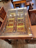 INDIA PANELED DOOR WITH METAL ACCENTS TURNED INTO TABLE WITH 4 CHAIRS