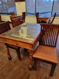 INDIA PANELED DOOR WITH METAL ACCENTS TURNED INTO TABLE WITH 4 CHAIRS