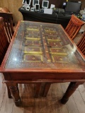 INDIA PANELED DOOR WITH METAL ACCENTS TURNED INTO TABLE WITH 4 CHAIRS