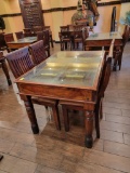 INDIA PANELED DOOR WITH METAL ACCENTS TURNED INTO TABLE WITH 4 CHAIRS