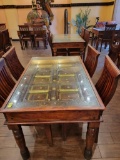 INDIA PANELED DOOR WITH METAL ACCENTS TURNED INTO TABLE WITH 4 CHAIRS