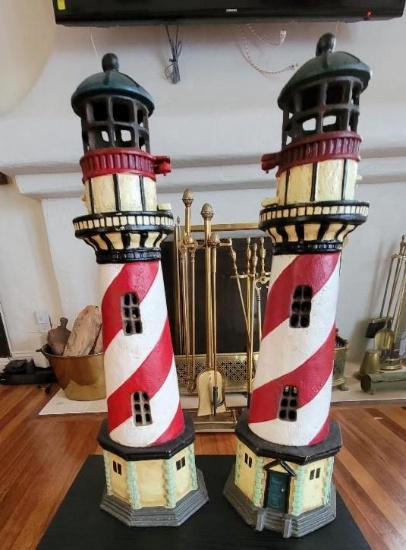 TWO METAL LIGHTHOUSE DECORATIONS