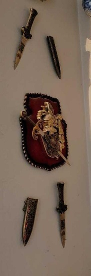 MINATURE SWORDS ON WALL