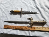 TWO ORNATE STAINLESS DAGGERS
