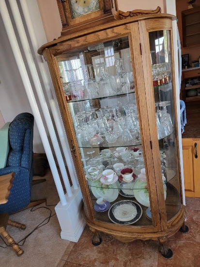 BOW FRONT LIGHTED CURIO WITH CONTENTS