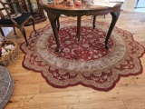 ORIENTAL FLORAL AND LEAF DECORATED ROUND RUG